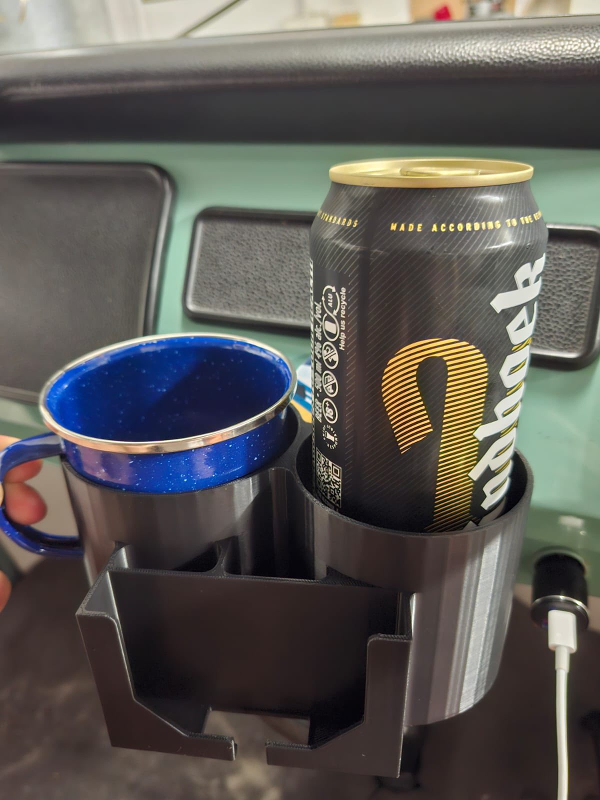 Cup holder with coffee mug and phone charging